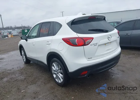 2015 Mazda Cx-5 Grand Touring z USA, uszkodzony, nr VIN JM3KE4DY8F0489930